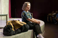 Aleisha Force sitting on the stage
